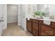 Stylish bathroom features dual sinks, ample storage, and well-lit vanity at 1034 Mapletree Ln, Indian Trail, NC 28079