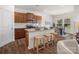Beautiful kitchen features stainless appliances, granite countertops and breakfast bar at 1034 Mapletree Ln, Indian Trail, NC 28079
