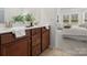 Modern main bathroom features double vanity, attractive cabinets, and tile flooring at 1034 Mapletree Ln, Indian Trail, NC 28079