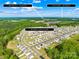 Aerial shot showcases the neighborhood's location, 5 minutes from I-77 and 10 minutes from Town of Troutman at 109 Fairfield Dr, Troutman, NC 28166