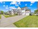 Charming two-story home with a well-manicured lawn, a two-car garage, and concrete drive at 109 Fairfield Dr, Troutman, NC 28166