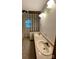 This bathroom features double sinks with updated faucets at 127 Edgeway Rd, Mooresville, NC 28117