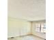 Bright living room with neutral walls and carpeted flooring, bathed in natural light at 127 Edgeway Rd, Mooresville, NC 28117