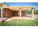 View of covered porch with brick columns and stained concrete porch at 153 Coachman Loop, Statesville, NC 28625