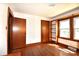 Hardwood floors and built-in shelving add charm and character to this inviting bedroom space at 17389 Mooresville Rd, Mooresville, NC 28115