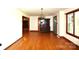 Bright dining room featuring hardwood floors and classic wood trim at 17389 Mooresville Rd, Mooresville, NC 28115