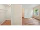 View into an additional bedroom showing access to closet and natural light at 1938 Dembrigh Ln, Charlotte, NC 28262