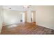 Bright bedroom features beautiful hardwood floors and vaulted ceilings at 1938 Dembrigh Ln, Charlotte, NC 28262