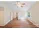 Bright bedroom features beautiful hardwood floors and vaulted ceilings at 1938 Dembrigh Ln, Charlotte, NC 28262