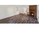 Inviting living room with a brick fireplace, providing a cozy atmosphere at 1938 Dembrigh Ln, Charlotte, NC 28262