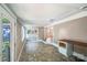 Bright living room features multi-tone tile flooring and plenty of sunlight at 1938 Dembrigh Ln, Charlotte, NC 28262