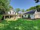 Lovely home with a well-maintained lawn and a detached garage in the backyard at 2018 Radcliffe Ave, Charlotte, NC 28207