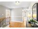 Upper hallway with hardwood floors and views of bedrooms at 2036 E Foxwood Ct, Indian Land, SC 29707