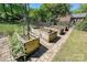 Raised garden beds in backyard with brick pavers and fenced in garden at 205 Commodore Ct, Belmont, NC 28012