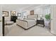 Elegant bedroom with a stylish bed, soft lighting, and sophisticated decor at 205 Commodore Ct, Belmont, NC 28012