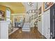 Elegant foyer with hardwood floors, chandelier, staircase, and graceful accents at 205 Commodore Ct, Belmont, NC 28012