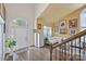 Inviting foyer with hardwood floors, natural light, and a view of the staircase at 205 Commodore Ct, Belmont, NC 28012