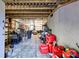 Unfinished garage space, great for storage with exposed wood beams and concrete flooring at 205 Commodore Ct, Belmont, NC 28012