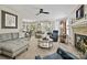 Inviting living room featuring a fireplace, comfortable seating, and access to the outdoor space at 205 Commodore Ct, Belmont, NC 28012