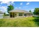 Beautiful backyard boasts a well-maintained lawn and a patio at 2113 London Ln, Belmont, NC 28012