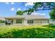 Expansive backyard featuring lush green grass and a patio area perfect for outdoor activities at 2113 London Ln, Belmont, NC 28012
