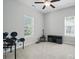 Spare bedroom with neutral paint, ample light, and ceiling fan at 2113 London Ln, Belmont, NC 28012