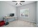 Spare bedroom featuring neutral paint, natural light, and ceiling fan at 2113 London Ln, Belmont, NC 28012
