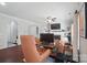 Spacious living room with hardwood floors, white trim, and large arched doorways leading to other living areas at 2113 London Ln, Belmont, NC 28012