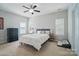 Spacious main bedroom with ceiling fan, ample natural light, and neutral decor at 2113 London Ln, Belmont, NC 28012