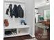 Welcoming mud room with built-in storage bench and easy access to the living area at 2113 London Ln, Belmont, NC 28012