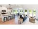 Open living space with an island, eat-in kitchen, dining table, cozy furniture, and lots of natural light at 2133 Tite Rd, Stanfield, NC 28163
