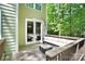 Inviting deck area with comfortable seating and a view of the lush green surroundings at 2417 Labelle Dr, Waxhaw, NC 28173