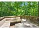 Spacious outdoor deck with ample seating and table, ideal for entertaining or relaxing in nature at 2417 Labelle Dr, Waxhaw, NC 28173