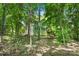 Secluded two-story home nestled among lush trees with a deck at 2417 Labelle Dr, Waxhaw, NC 28173