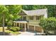 Charming two-story home with a well-manicured lawn, two-car garage, and inviting front porch at 2417 Labelle Dr, Waxhaw, NC 28173