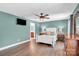 Comfortable main bedroom with ceiling fan and ensuite bathroom at 2417 Labelle Dr, Waxhaw, NC 28173