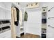 Bright walk-in closet offers ample storage with shelving and space for organization at 2417 Labelle Dr, Waxhaw, NC 28173