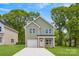 Two-story home with a well-maintained lawn and driveway at 3056 Goble St, Gastonia, NC 28056