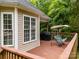 Cozy back deck with outdoor seating, a grill, and views of the surrounding landscape at 3179 Westview Rd, Concord, NC 28025