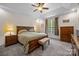 Serene main bedroom with neutral tones, tray ceiling, and a comfortable queen-sized bed at 3179 Westview Rd, Concord, NC 28025