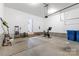 Spacious garage with room for parking and storage, and potential for a home gym at 3245 Major Samuals Way, Charlotte, NC 28208