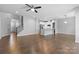 Spacious living room featuring hardwood floors, recessed lighting, and an open floorplan to the kitchen at 3245 Major Samuals Way, Charlotte, NC 28208