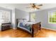 Inviting bedroom featuring hardwood floors, plenty of natural light, and neutral color palette at 3300 Paul Heavner Ln, Lincolnton, NC 28092
