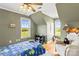 Cozy bedroom featuring hardwood floors, ample natural light, and neutral color palette at 3300 Paul Heavner Ln, Lincolnton, NC 28092