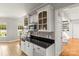 Bright eat-in kitchen boasts stainless appliances, granite counters, and hardwood floors at 3300 Paul Heavner Ln, Lincolnton, NC 28092