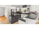 Stylish kitchen with stainless steel appliances, granite counters, and island with breakfast bar at 3300 Paul Heavner Ln, Lincolnton, NC 28092