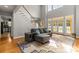 Bright living room with hardwood floors, high ceilings, staircase, and French doors to backyard at 3300 Paul Heavner Ln, Lincolnton, NC 28092