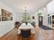 Spacious dining room with ample natural light and seating at 3519 Weddington Oaks Dr, Matthews, NC 28104