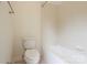 Bathroom featuring a shower and tub combination, as well as a standard toilet at 3937 Arbor Ln # H, Charlotte, NC 28209