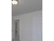 Bedroom featuring a neutral color palette and closet doors at 4018 Larkhaven Village Dr, Charlotte, NC 28215